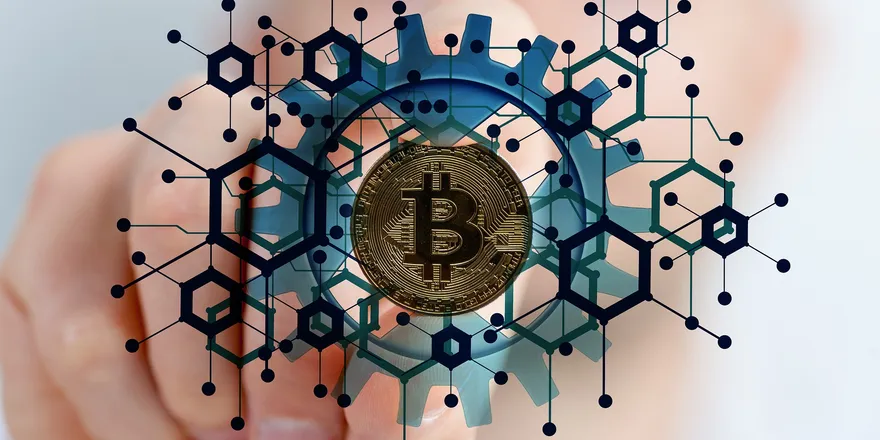 Bitcoin symbol rendered over a field of data
